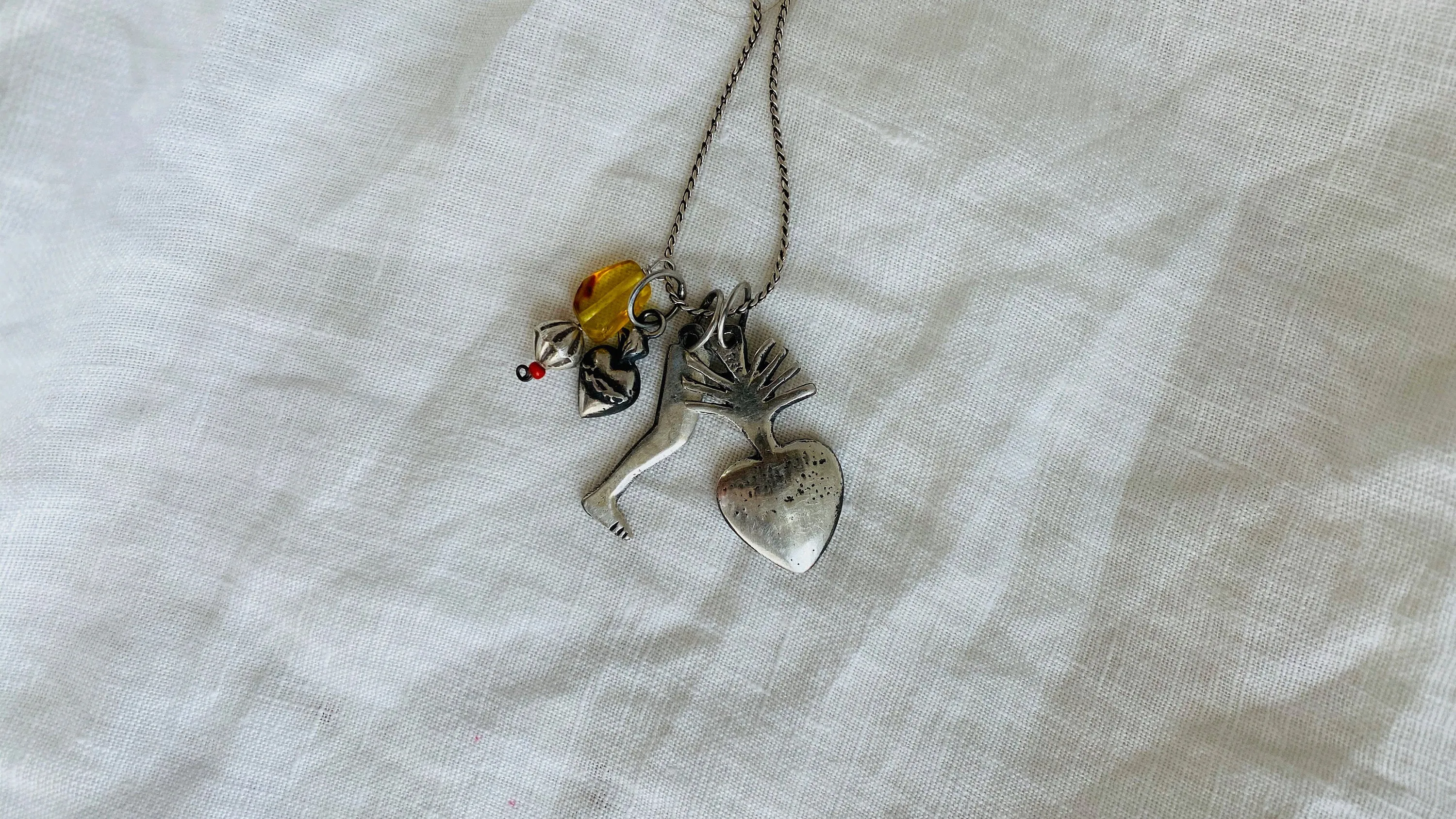 Milagro Pendants Necklace. Mexico. Sterling Silver and Amber.