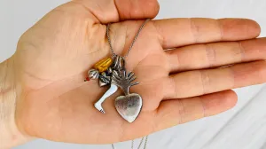 Milagro Pendants Necklace. Mexico. Sterling Silver and Amber.