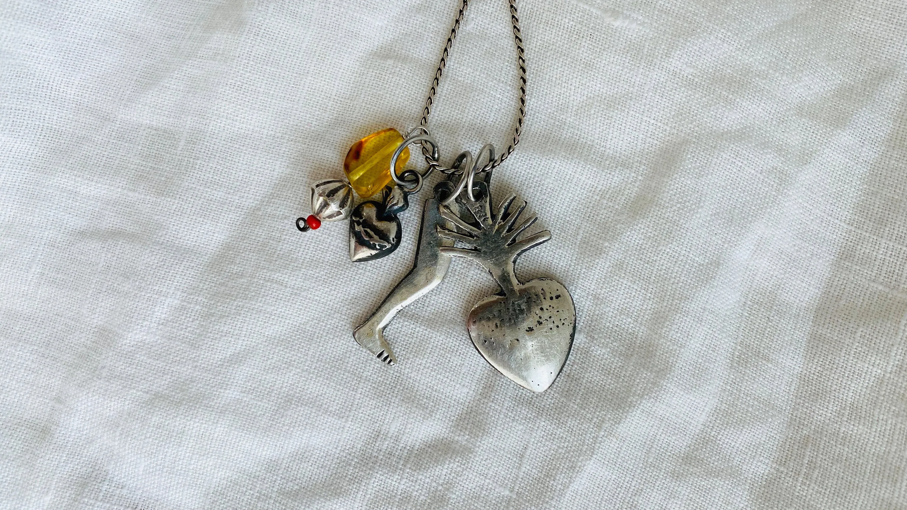 Milagro Pendants Necklace. Mexico. Sterling Silver and Amber.