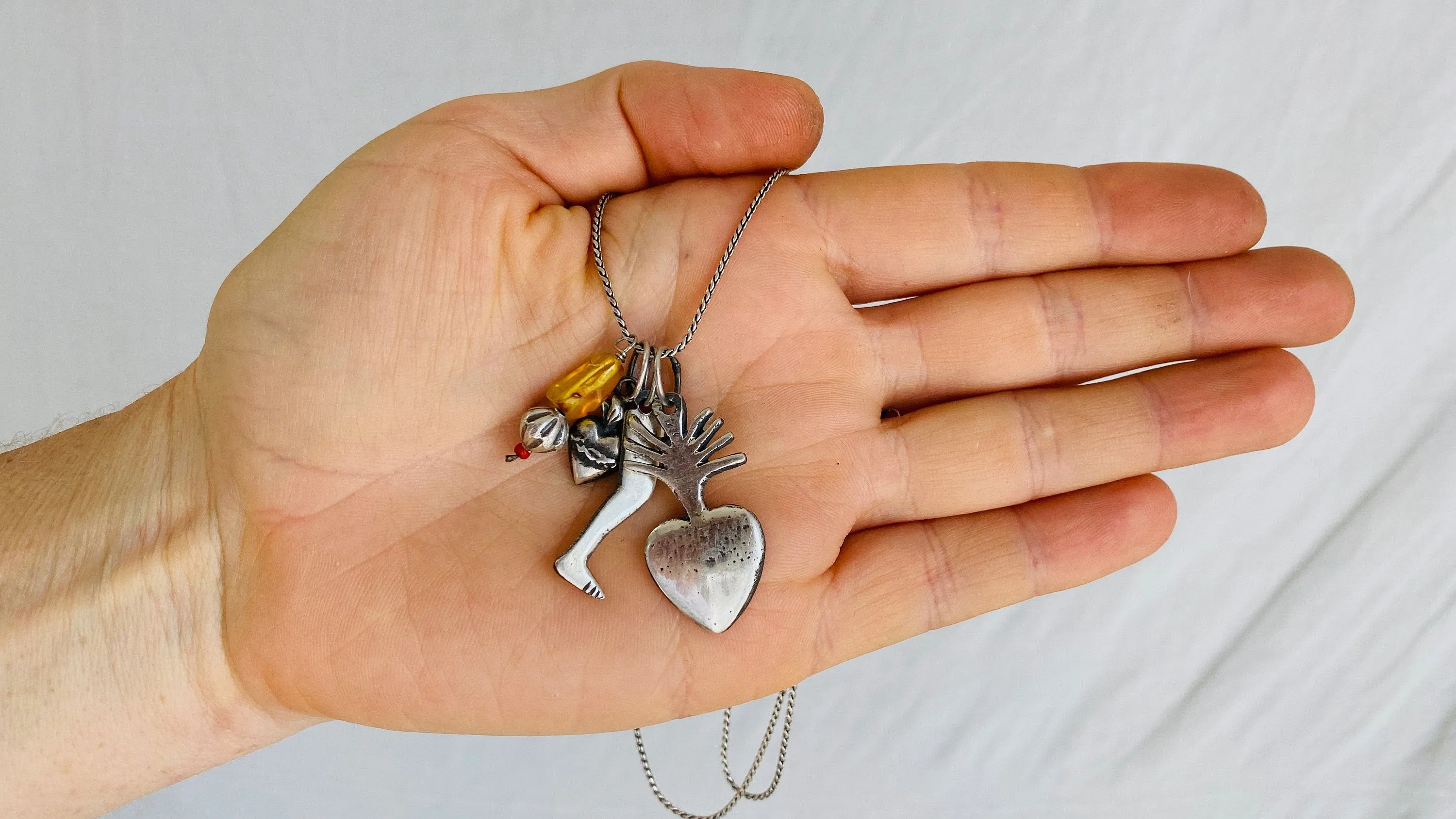 Milagro Pendants Necklace. Mexico. Sterling Silver and Amber.
